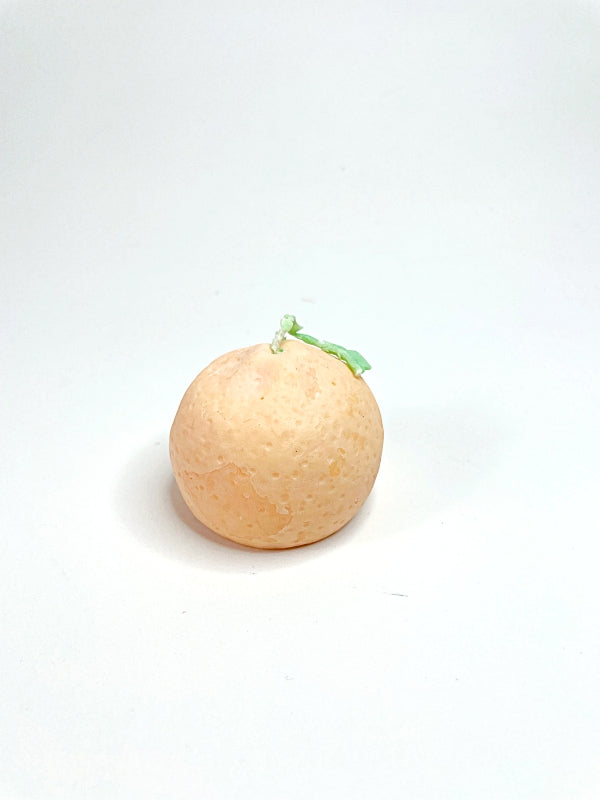 Vela decorativa con forma de naranja con aroma a naranja